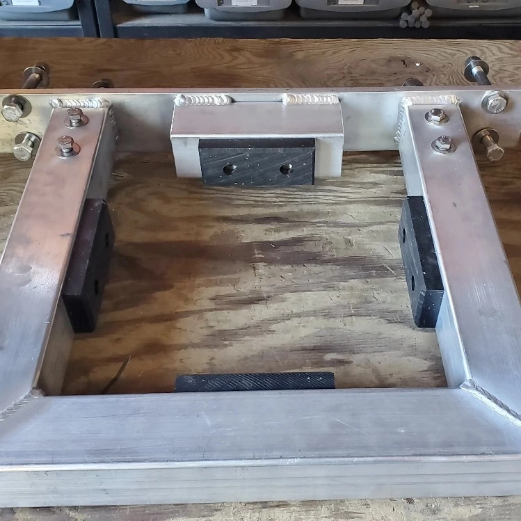 Pile Brackets with UHMW Blocking